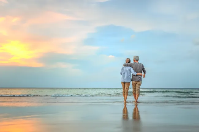 Couple walking on beach
